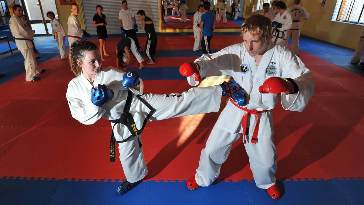  WAGGA: Ready for the 2013 AAITF National Taekwondo Championships, held in Wagga this weekend, are Kaitlin Jeffires and Cameron Graham. Picture: Addison Hamilton