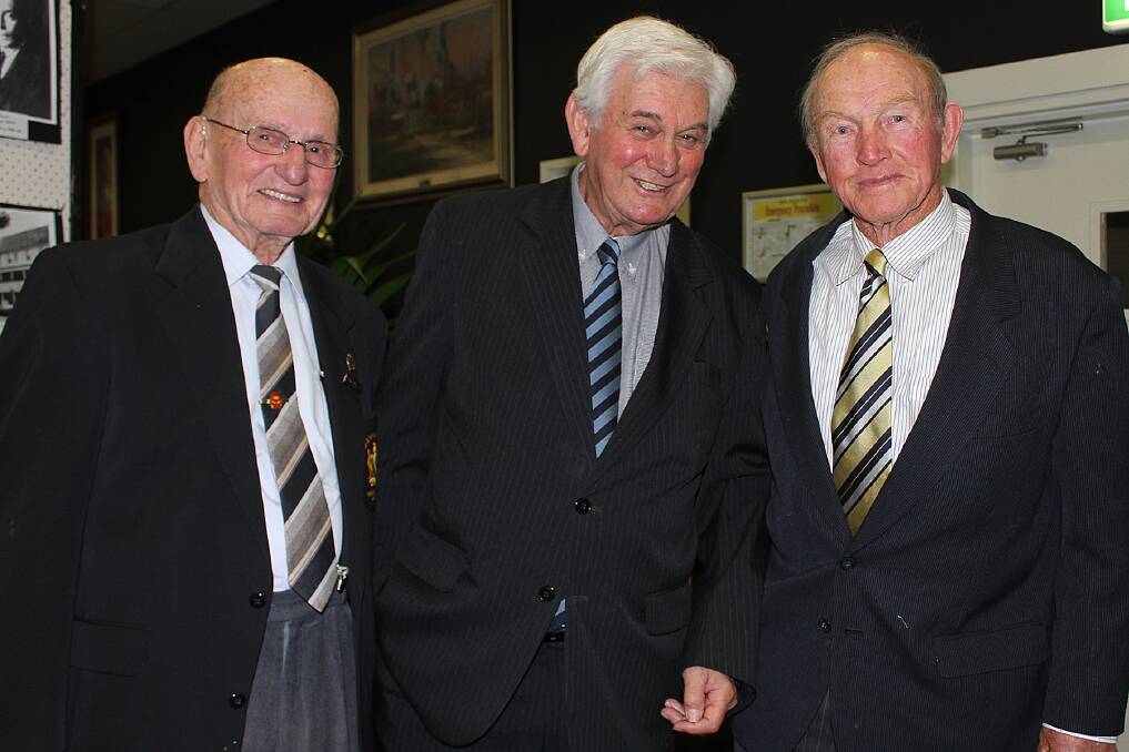 South Coast referees life member Bill Radford with league life member Les Harris and Gus Miller. Picture: DAVID HALL