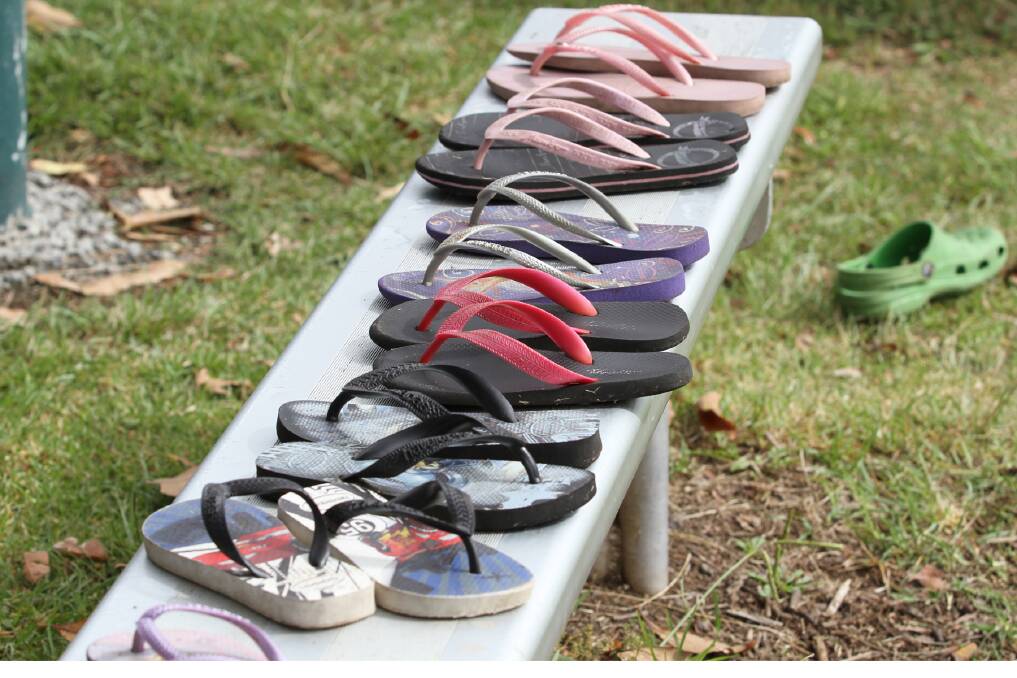 A real Aussie scene with thongs lined up.