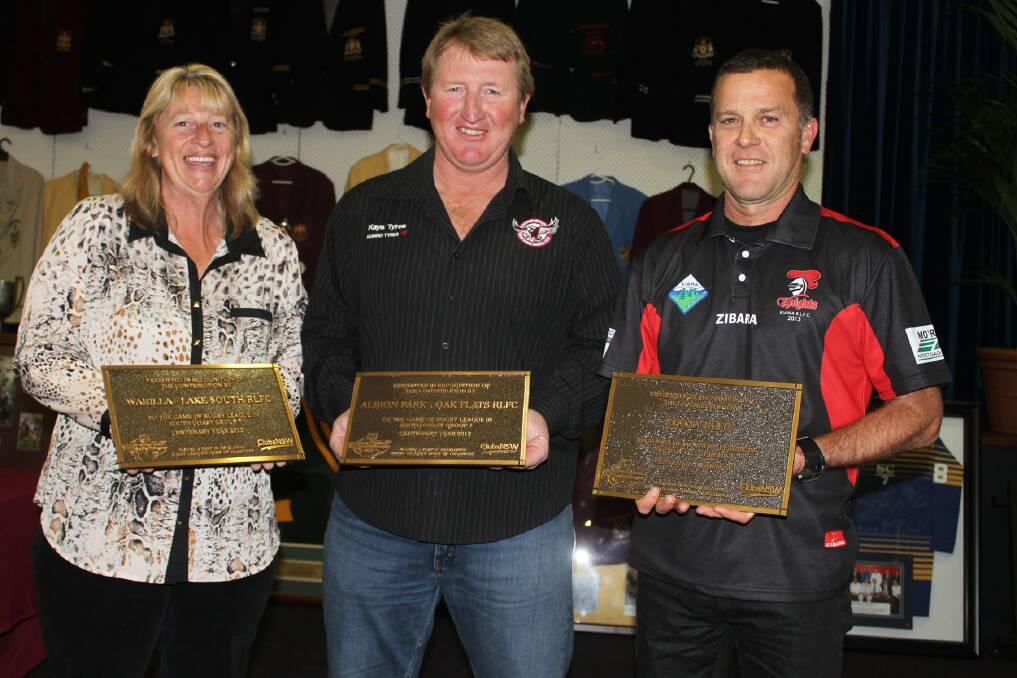 Sharon Clarke (Warilla-Lake South), Ralph Clarke (Albion Park-Oak Flats) and Paul Atkins (Kiama) with their Centenary plaques. Picture: DAVID HALL