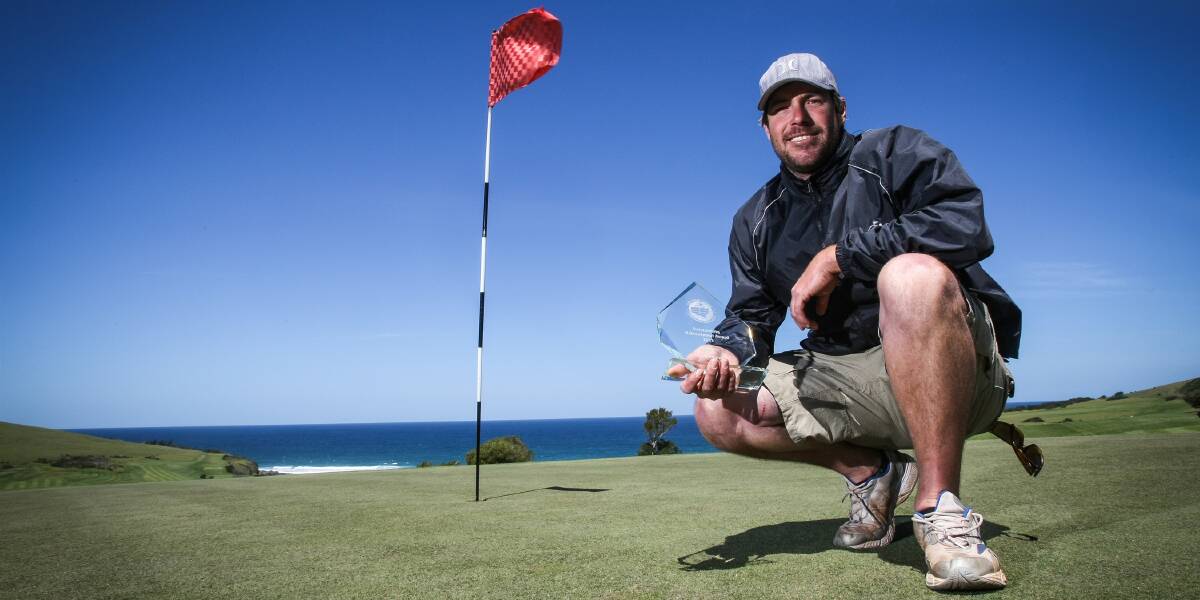 Brad Huender with his prestigious award at Gerringong Golf Course last week.