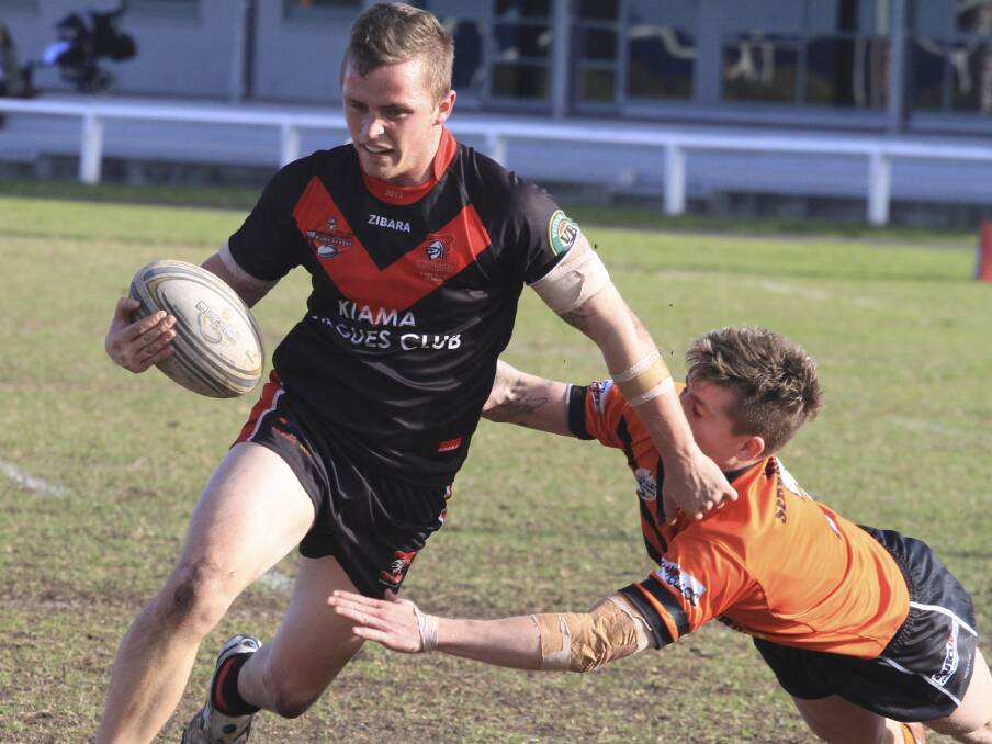 Kiama Knights centre James Gilmore skirts the Batemans Bay defence during Sunday's match at Kiama Showground. Picture: MITCH WESTON