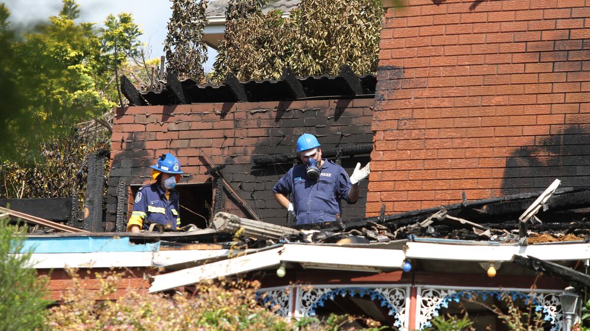 Police Forensis Investigators comb the Gerringong home where a women died and left her husband in a critical condition with burns. Picture: DAVID HALL