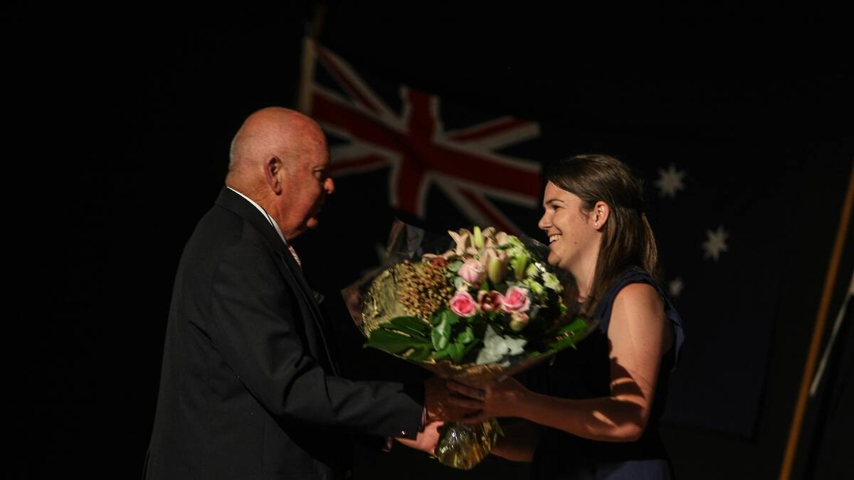 Councillor Warren Steel presented Kimberley Abbott with flowers.
