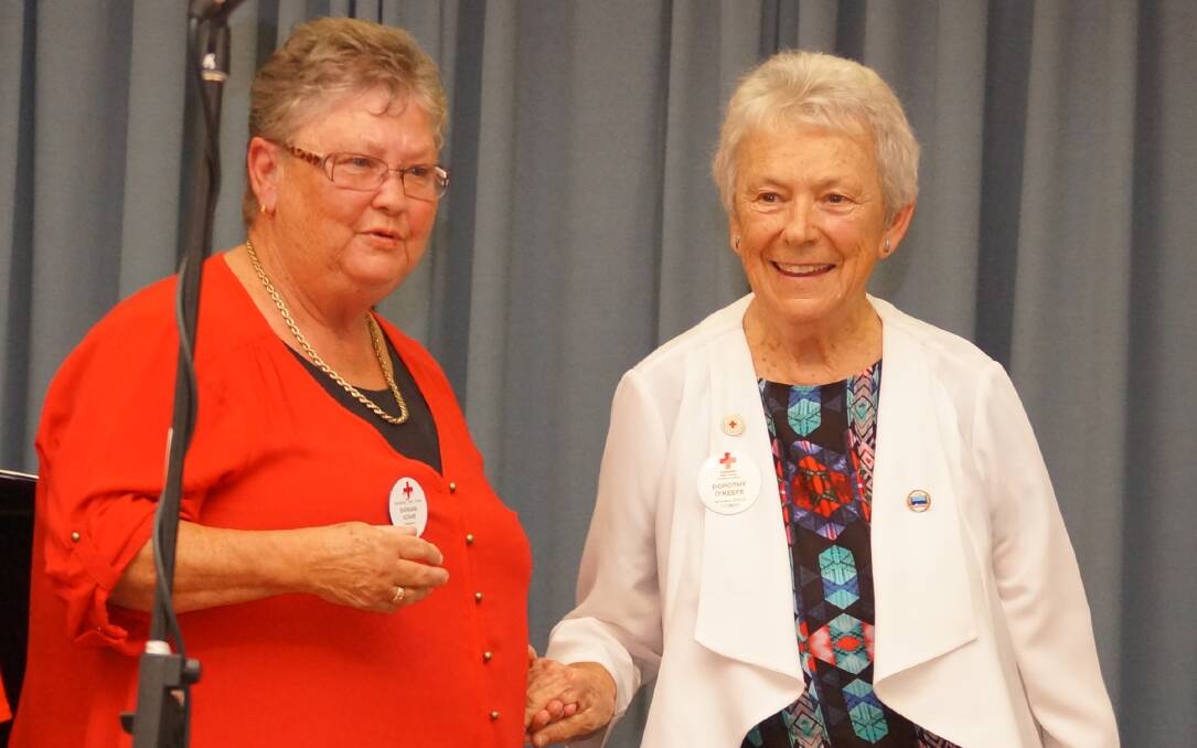 Mrs Barbara Adams President of Jamberoo Red Cross and Mrs. Dorothy O'Keefe, author of  A History of the Jamberoo Red Cross Branch.