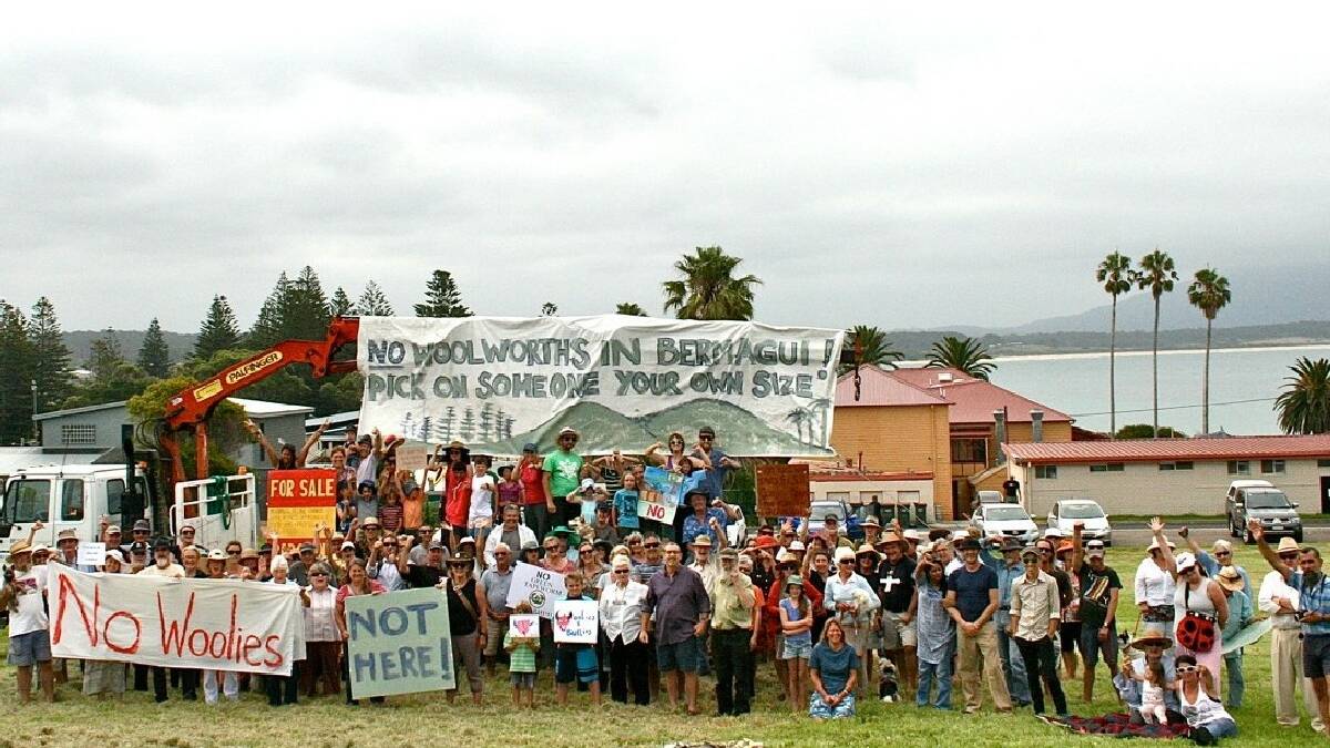 BERMAGUI: Opponents of the proposed Woolworths at Bermagui gathered at the supermarket site on Sunday with lots of signs and songs to sing.