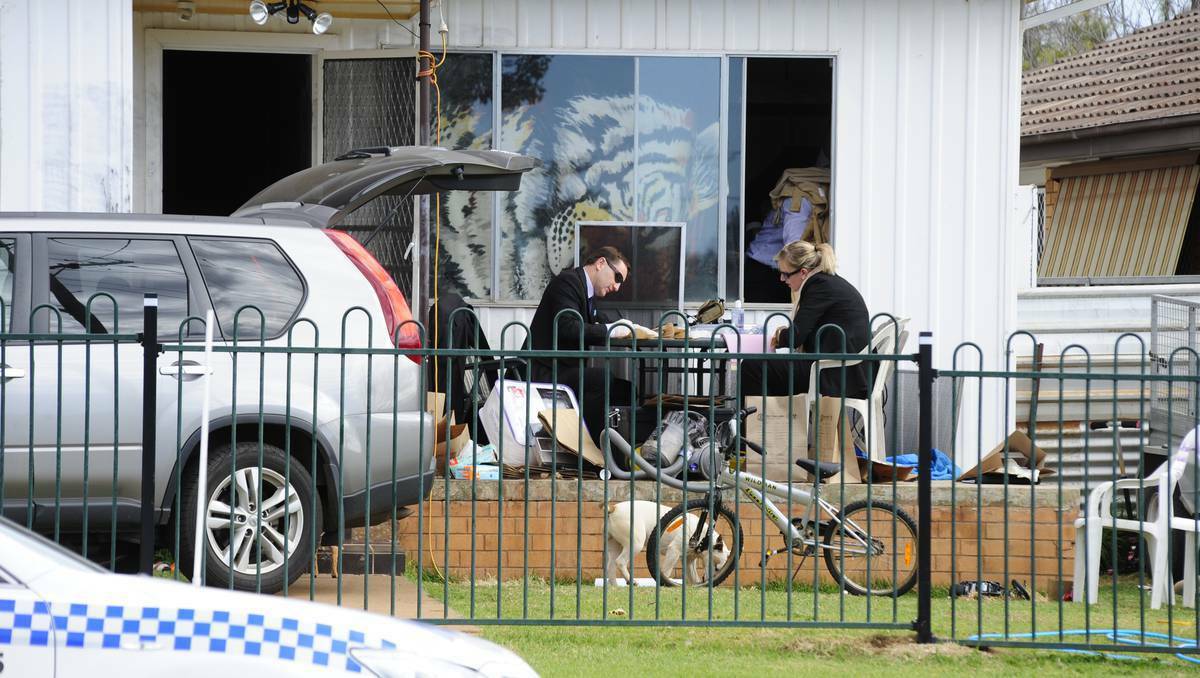 Police gather evidence at an Alfred Street residence in Dubbo as part of their investigation into the disappearance 33-year-old Alois Rez. Picture: Belinda Soole