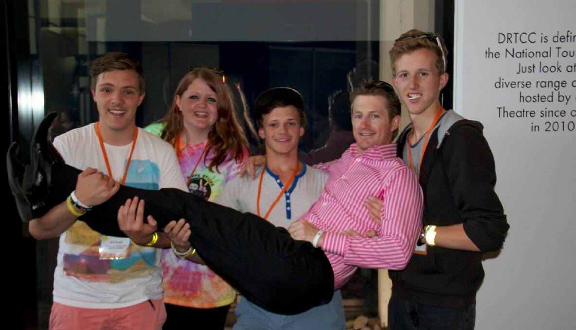 DUBBO: The Eurobodalla delegates at the NSW Youth Council conference in Dubbo pictured holding MC Michael Crossland. From left are Will Scobie, Frances Kerham, Tyler Struchlak and Ben Potter of Narooma.