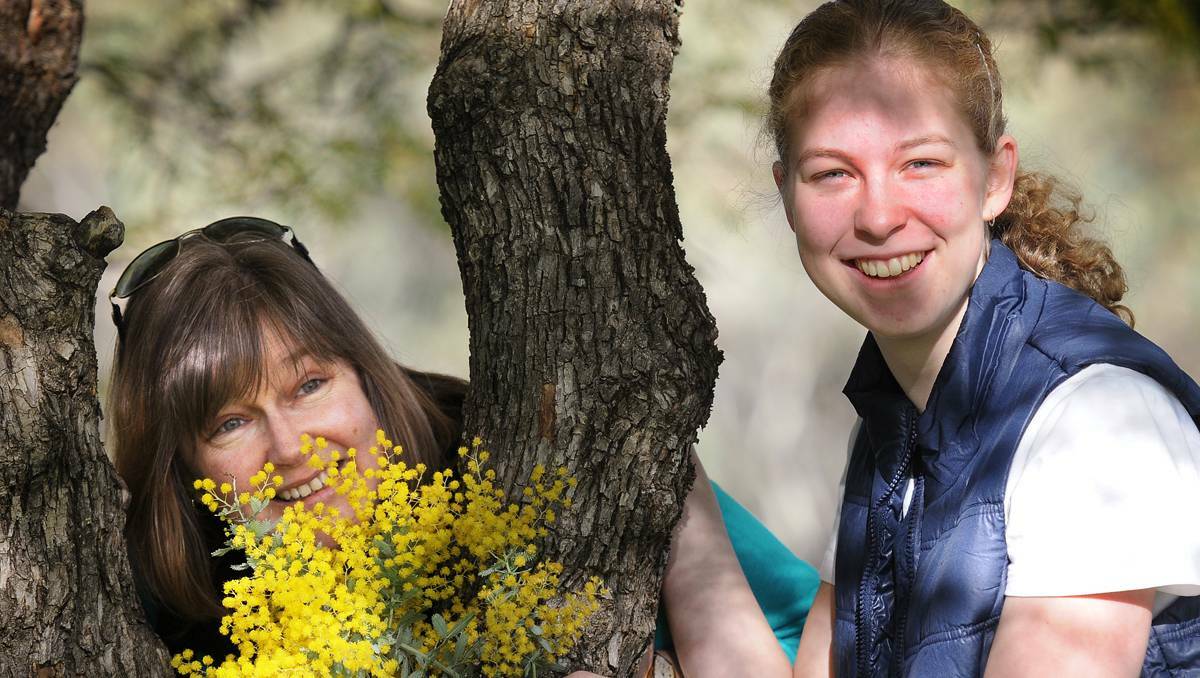Spring has sprung for northern NSW residents. Sharon Armstrong and her daughter Kate enjoy the warm winter weather. Picture: Gareth Gardner