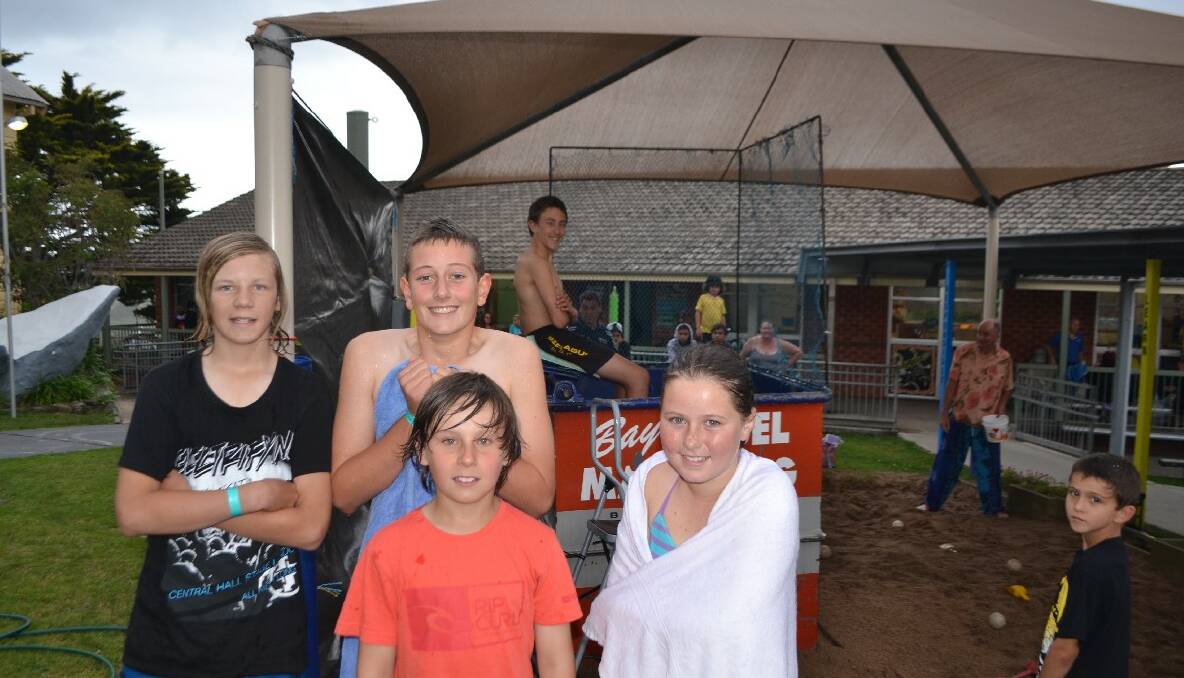 BERMAGUI: As if it wasn’t wet enough on Friday, students got dunked at Bermagui Public School’s Spring Fair included Billy, Liam, Reid, Katyln and Ryan.