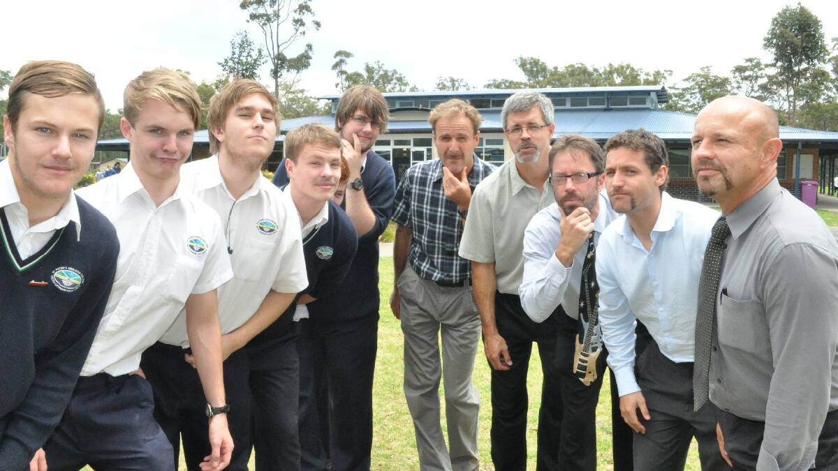 BROULEE: St Peter's Anglican College students Cameron Graham, Ryan Vest, Bailey Scholtz, Joshua Stephen, Jack Kennedy and Mason Appleby and teachers Russell Fletcher, David Kleuskens, John Fraser, Danny Freeman and David Toghill are in a battle of the 'tache for Movember.