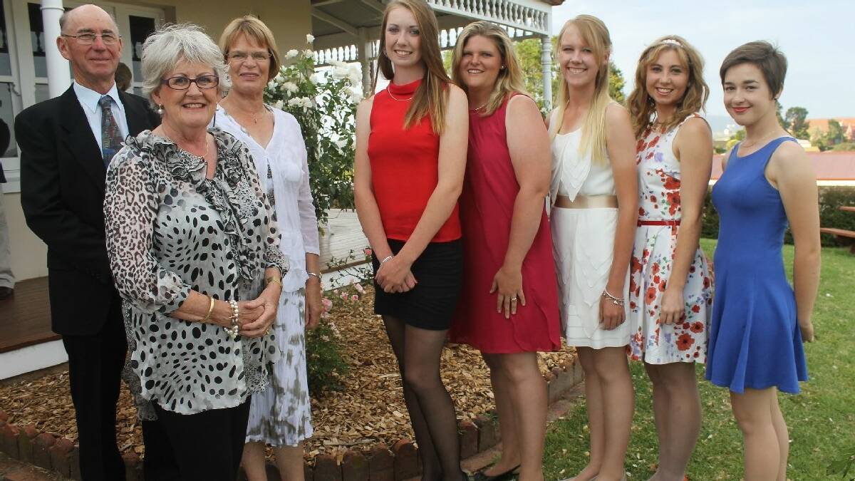 BEGA: Brodie Chester (third from right) is the Bega Showgirl for 2014, with the announcement made at a recent formal dinner. Georgia Shellard (second from right) was named runner-up.