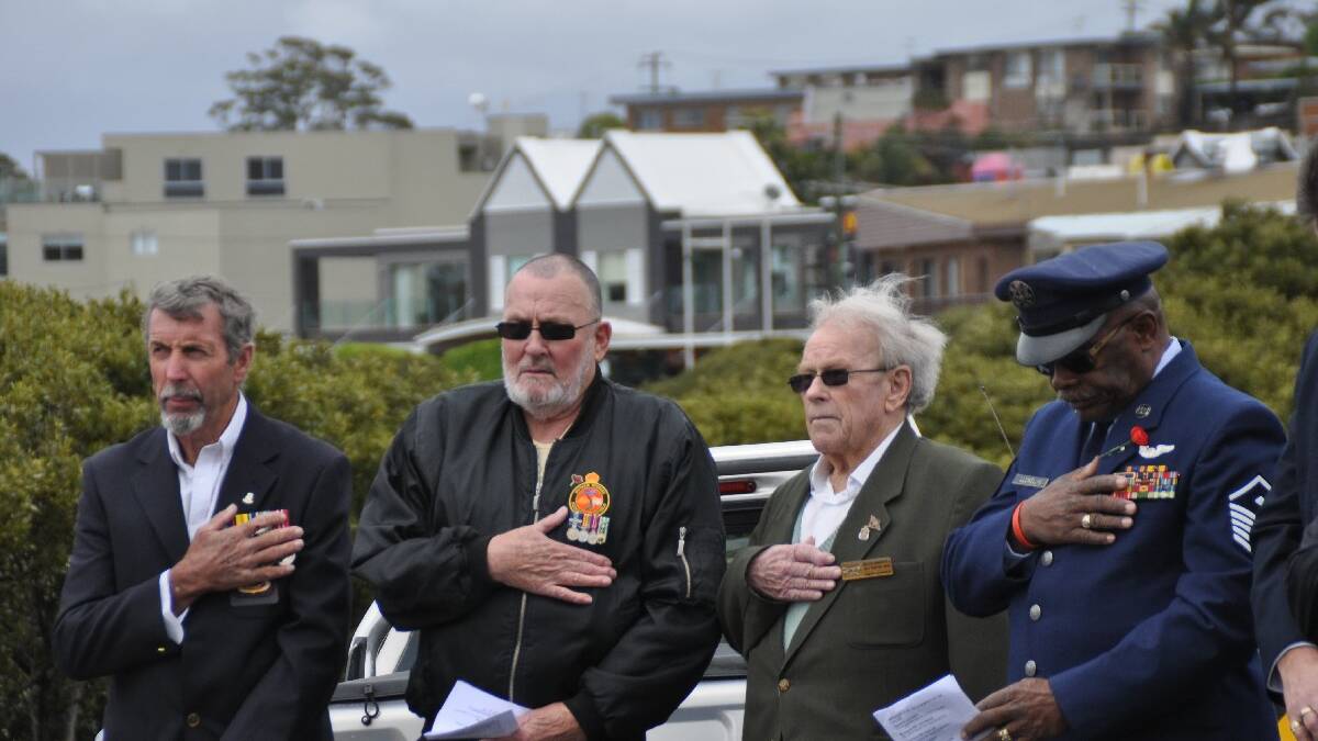  MERIMBULA: Merimbula RSL Sub- branch members pay their respects to the fallen on Remembrance Day. Phil Hall, left, Kevin Webb, WWII veteran, Bob O’ Donnell and   Lonnie Llewellyn. 