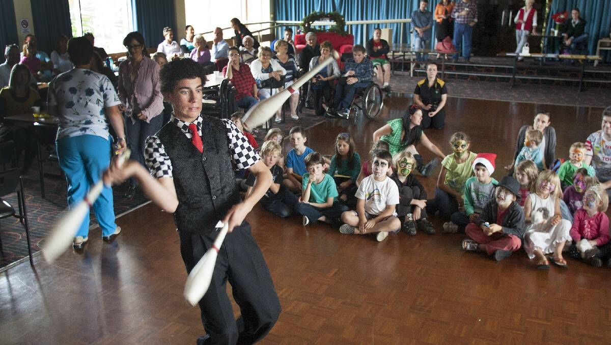 BERMAGUI: Young magician Rhys Davies entertains at Bermagui's International Day of People With Disability event.