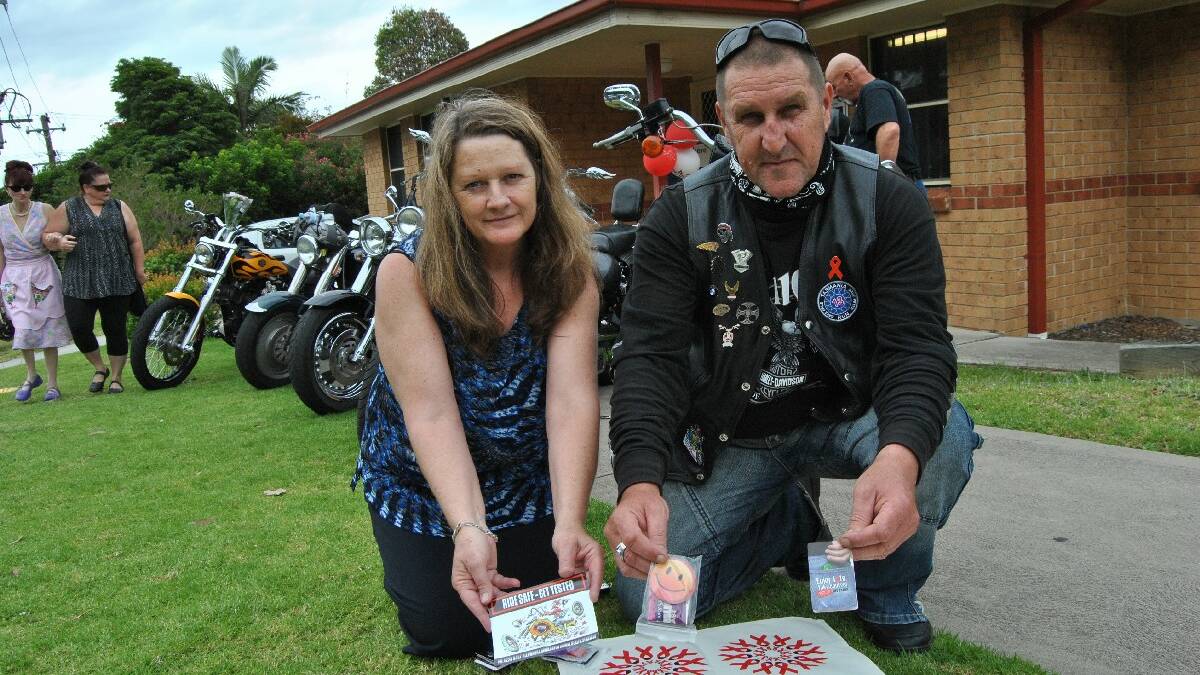 ULLADULLA: Maria Mitchell and Geza Belley combine to raise awareness about HIV and AIDS as Geza and group of health workers on Harley Davidson rumbled through Ulladulla on a trip up and down the Princes Highway, ending at the Port Kembla Hospital on Sunday, December 1 - World AIDS Day.