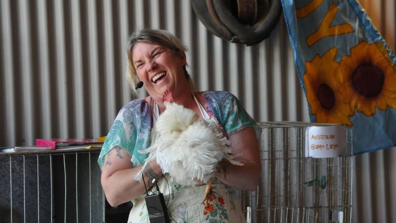 PAMBULA: Poultry breeder, Tabitha Bilaniwskyj-Zarins, of Candelo had the audience glued to her every move as she showed them how to wash a chook. 
