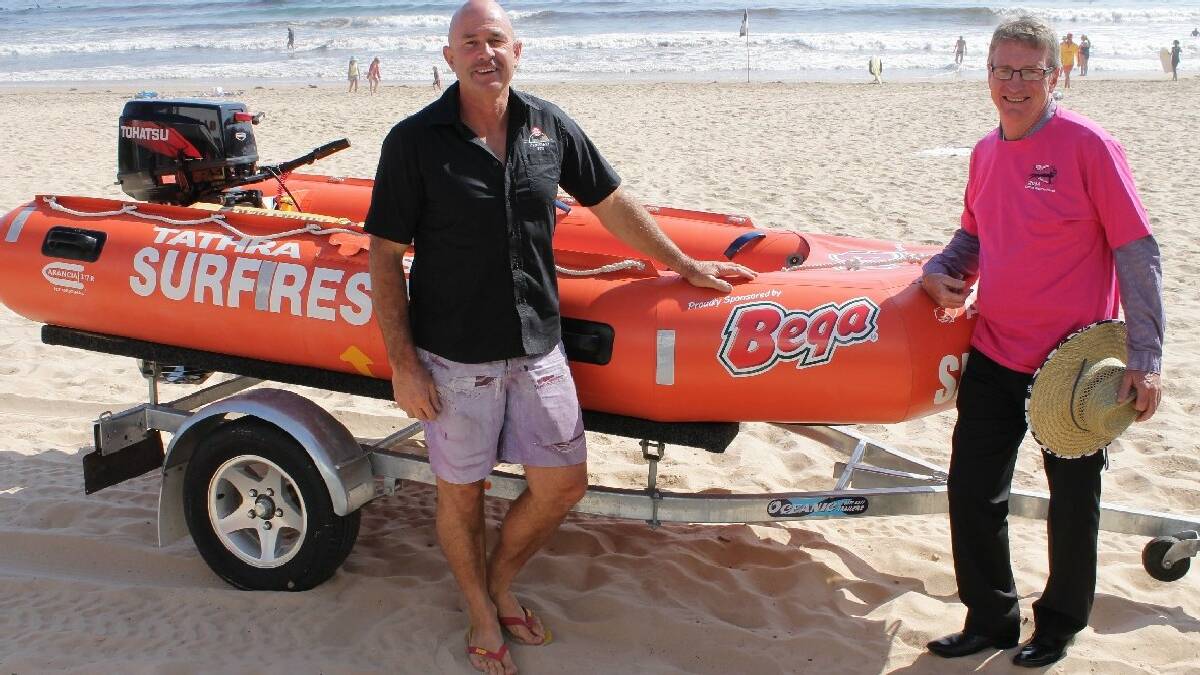 TATHRA: Tathra Surf Life Saving Club member Tony Rettke thanks Bega Cheese executive chairman Barry Irvin for the company's $10,000 donation that allowed the purchase of a new IRB.