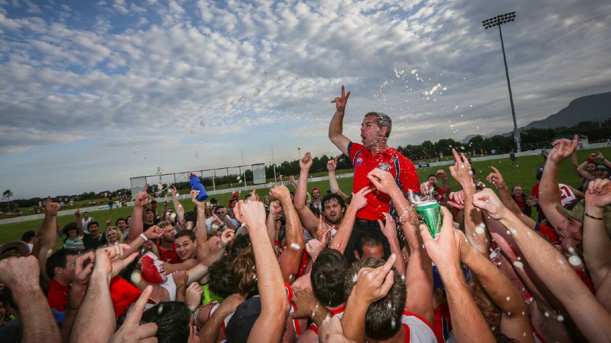 Senior AFL Grand Final. Wollongong coach Lee Murray is cheered on after the Bulldogs win over Kiama. Picture: DYLAN ROBINSON