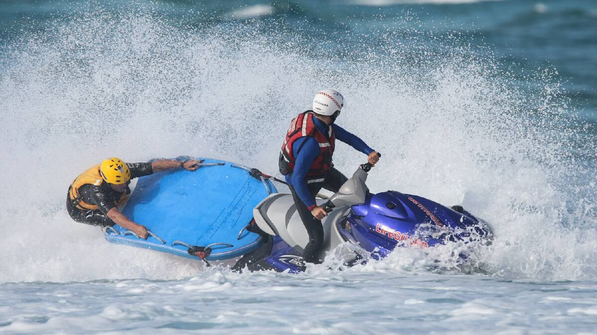 Former Kiama head lifeguard Jamie Caldwell trains police at Bombo beach. Picture: DYLAN ROBINSON