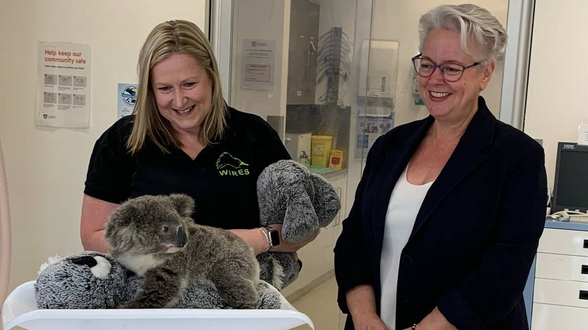 Environment minister Penny Sharpe (right) meets Mack during a weight check in 2023. Picture WIRES