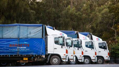 Trucks at the Barnett's Couriers yard in North Wollongong. Picture from file