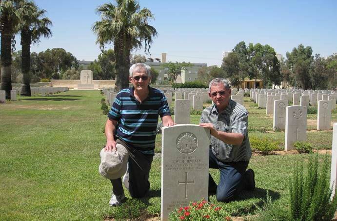 Honoured: Roy and Jeff Freak at the headstone of Thomas William Mountain in Beersheba.