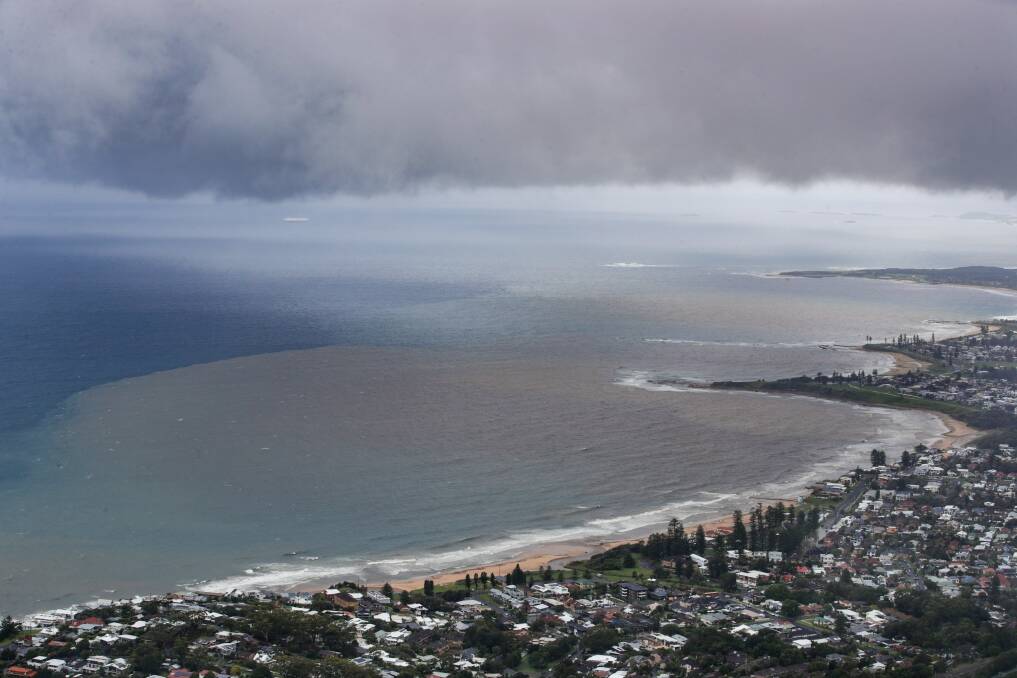 February 9. Flood waters mix with sea water turning the ocean brown in aftermath of a severe weather event that hit the Illawarra brining flash flooding across the region.