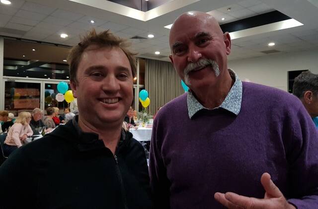 A visiting player from Canberra, Simon Graham, with "Legend" Mark Edmondson at the dinner on Saturday.