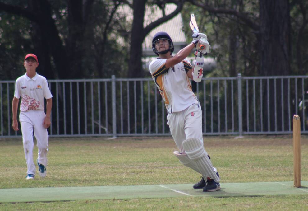 Gerringong under 14s player George Michael smashing one for six in his score of 48. Photo: Romy Speering.

 