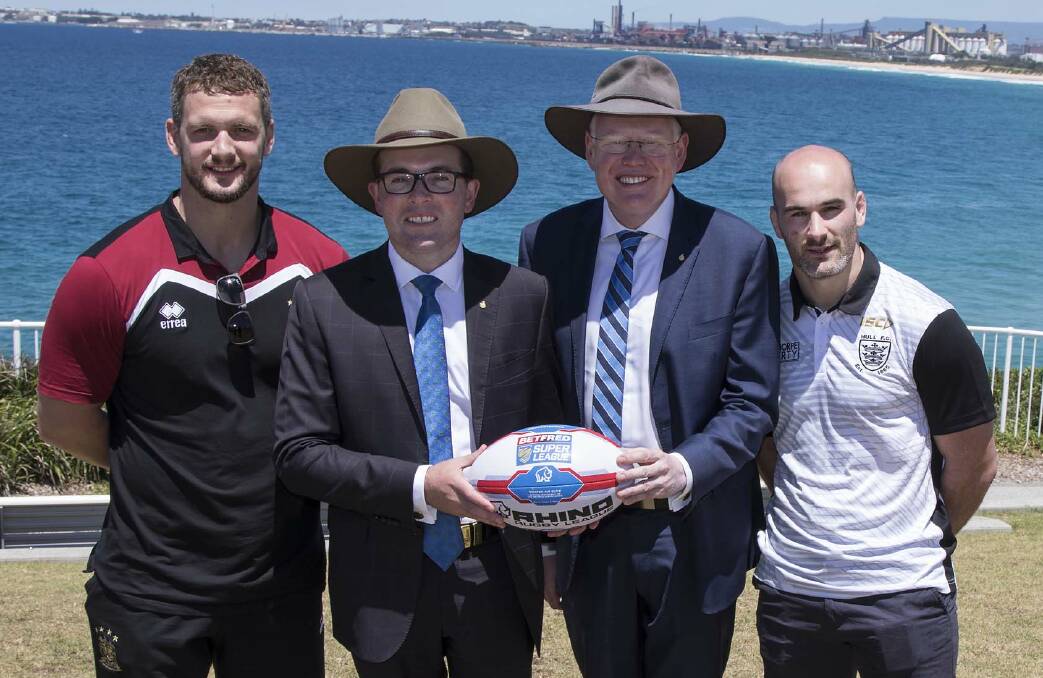 BIG WEEK: Adam Marshall and Gareth Ward with Wigan captain Sean O’Loughlin and Hull FC captain Danny Houghton on Monday. Picture: Destination NSW.