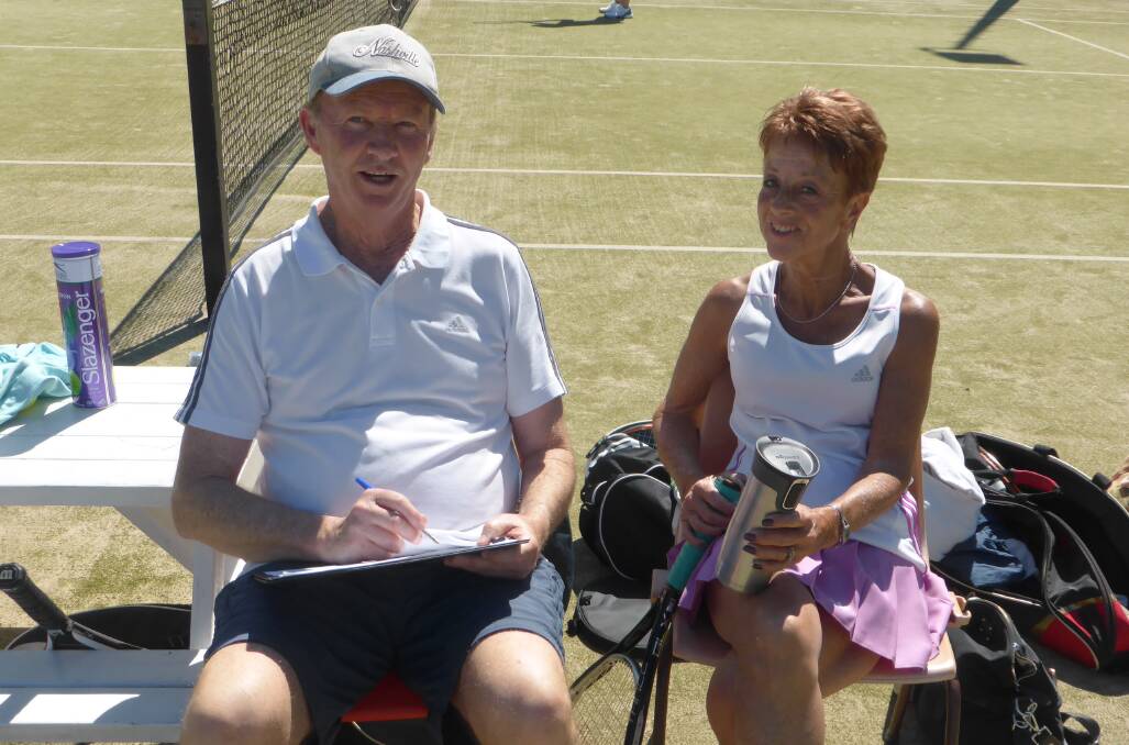 Tournament director Ross Smith and Dianna Etchells help get matches underway at the Kiama Tennis Centre.