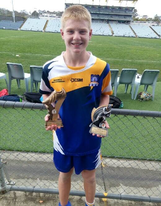 TOP HONOUR: Dylan Egan with his man of the match award and the man of the series trophies. Photo: Supplied.