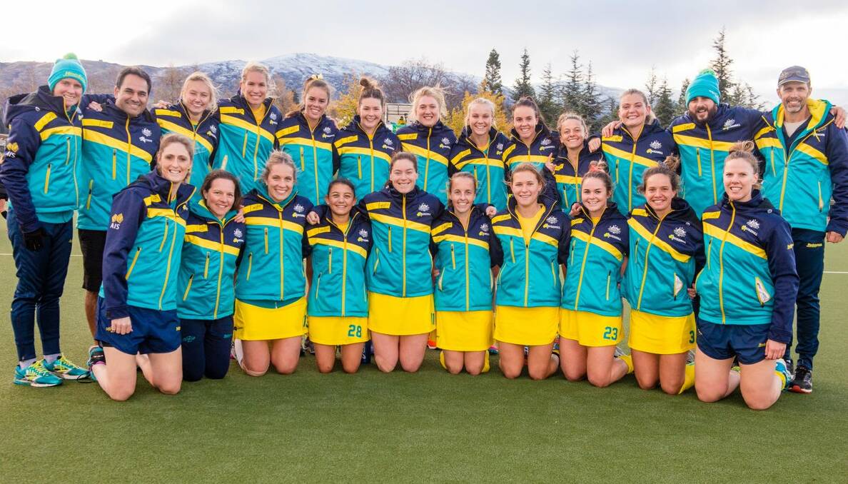 Grace Stewart (back row, fifth from left), Kalindi Commerford (front row, third from right) and their Hockeyroos team mates. Photo: HOCKEY AUSTRALIA