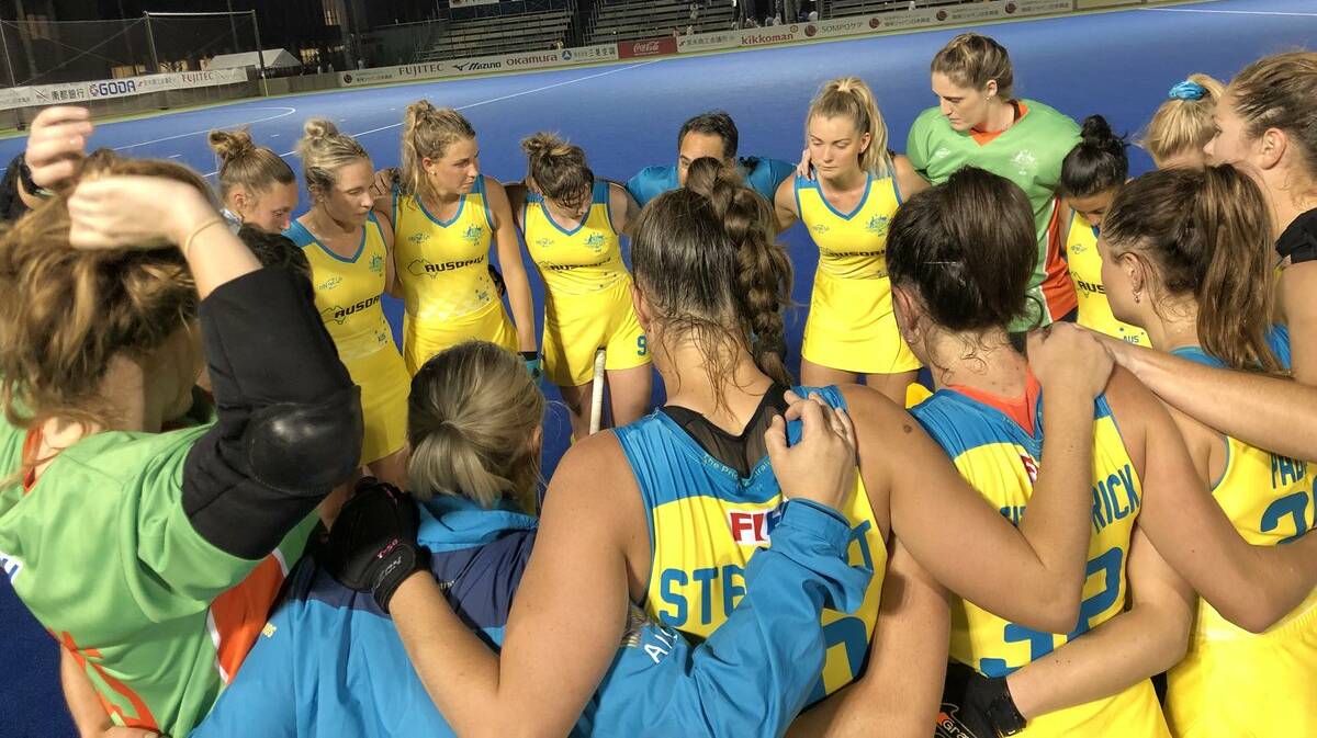 Gerringong's Grace Stewart and her Hockeyroos prior to their match with Japan. Photo: HOCKEY AUSTRALIA