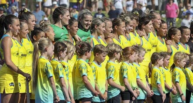 Grace Stewart (third from left) and her Hockeyroos team mates. Photo: HA