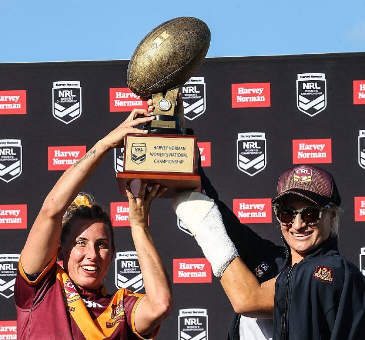 NSW Country's Sam Bremner and Ruan Sims with the trophy. Photo: CRL