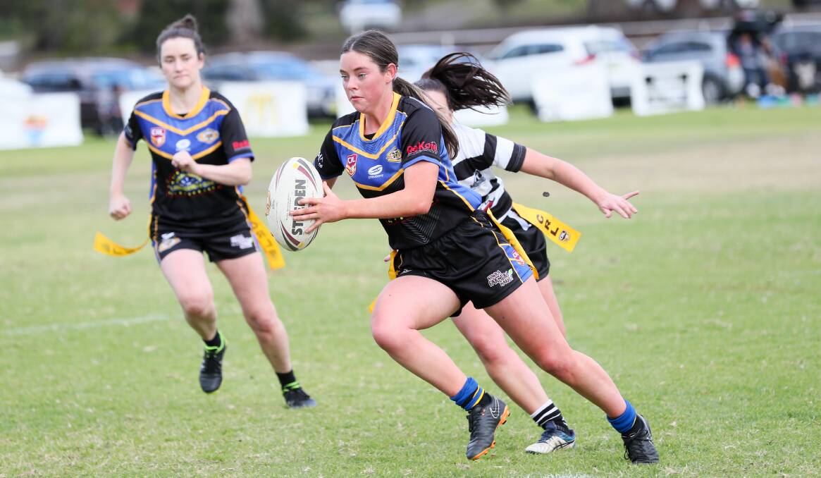 Nowra-Bomaderry Jets' Jessica Ward makes a break against Berry-Shoalhaven Heads last season. Photo: Giant Pictures