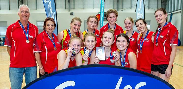 Neive Campbell (second from right) with her victorious Illawarra South Coast under 18s team. Photo: ISC HOCKEY