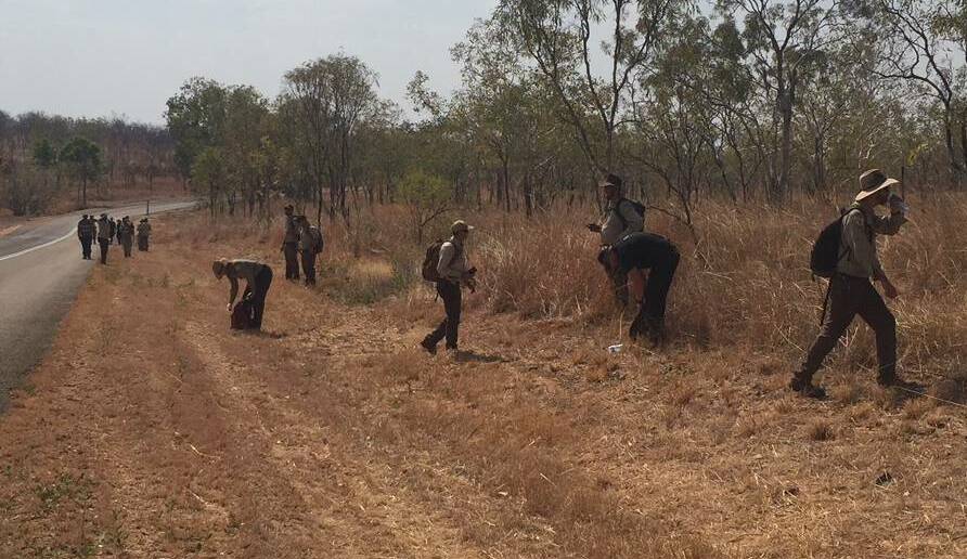 Park rangers and police conducted line searches through the thick bush.