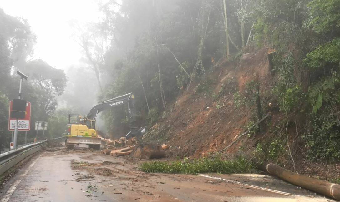 Clean-up: Road crews from Transport for NSW at work cleaning up Macquarie Pass after the weekend landslips. PIcture: Transport for NSW