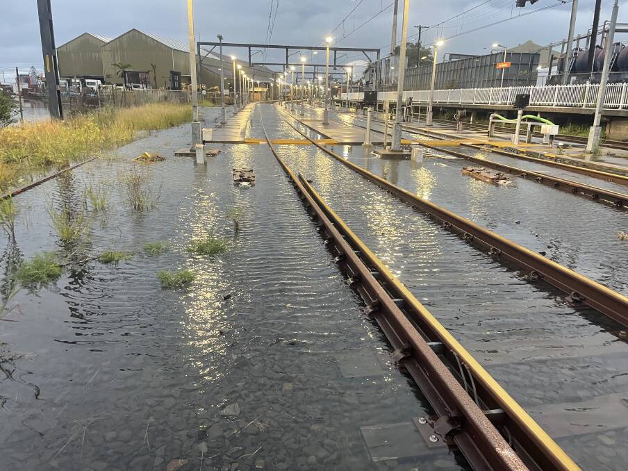 Flooding at Port Kembla station - the effects of Saturday's storm will be felt into the start of the working week. PIcture by Transport for NSW