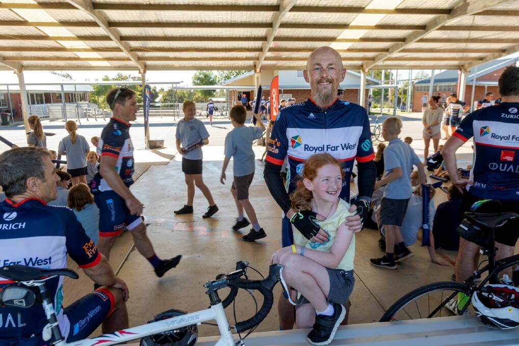 Ride ambassador Nathan Taylor, from Bathurst, and daughter Charlotte at Coolamon Central School.