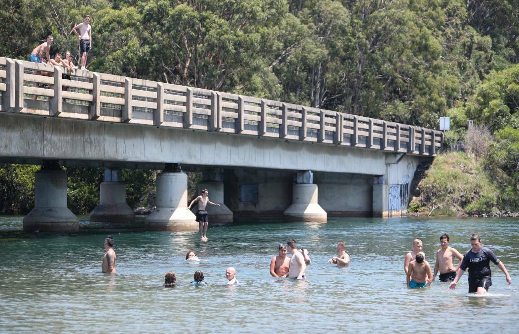 People cool off in the Minnamurra River. Picture: Adam McLean