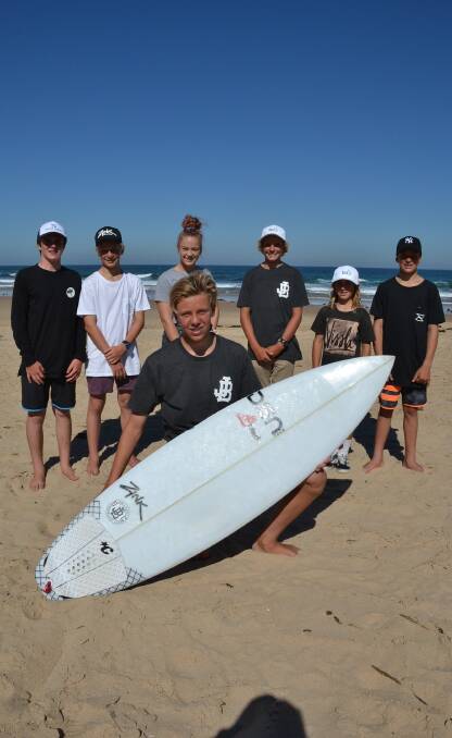 BOARD RIDERS: Keegan Willetts, Bayley Daniels, Tahlia Collinge, Max Bullen (front), Tom Feneley, Dayan Conti and Cooper Collinge at Jones Beach. Each of them helped out at the World Junior Titles. Picture: Rebecca Fist