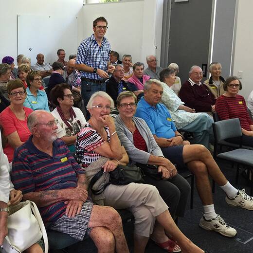 Stock picture of U3A participants listening to a lecture