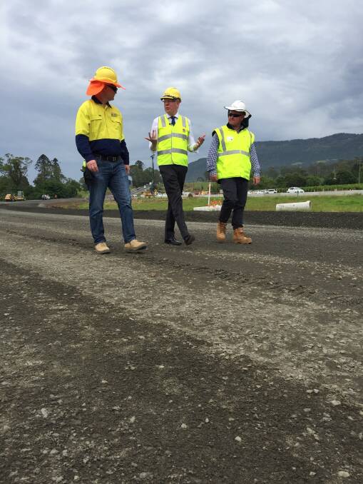 Kiama MP Gareth Ward speaks with key decision-makers on the Princes Highway duplication project near Silos Estate at Jaspers Brush on Monday.