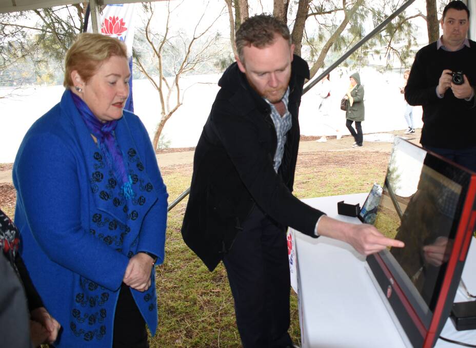 Gilmore MP Ann Sudmalis is taken through the RMS' interactive portal for the concept design and environmental assessment of the new Nowra bridge.