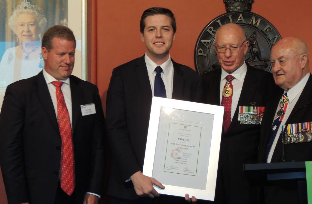 Bomaderry’s Paul Ell is congratulated on the award by vice-president Australia Youth Trust David Harvey, NSW Governor David Hurley AC DSC and president Australia Youth Trust Max Willis RFD ED CSI.