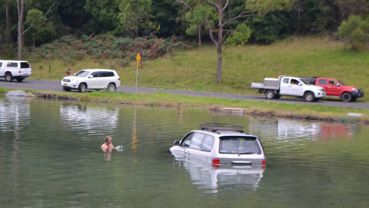 Photos of the minivan submerged in Mill Bay