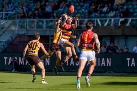 Adelaide Crows' Ben Keays flies for a mark when playing against Hawthorn at UTAS Stadium in Launceston in 2023. Picture by Phillip Biggs